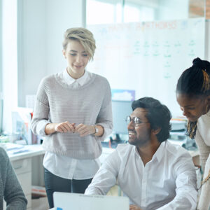 Colleagues collaborating in the office.