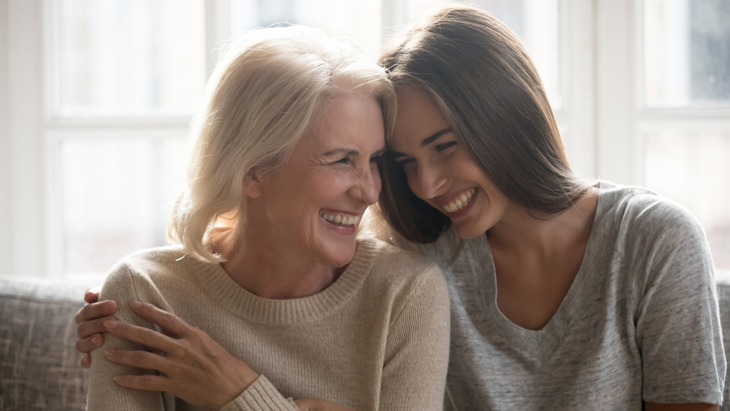 Mother and daughter embracing